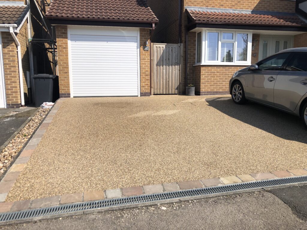 resin front driveway leading to garage