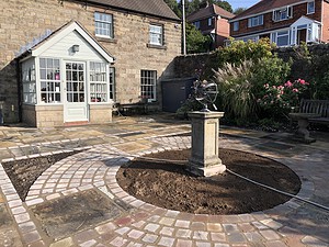 decorative stone feature with cast iron feature